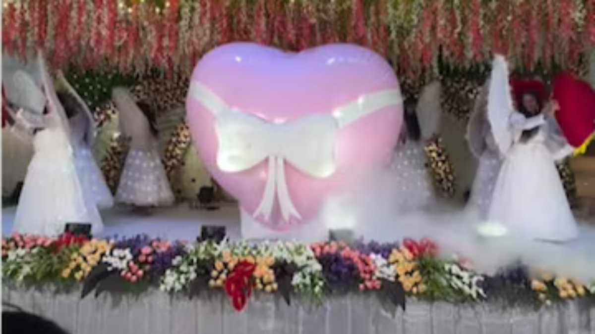 Couple’s Epic ‘Heart-Blast’ Wedding Entrance Goes Viral | WATCH