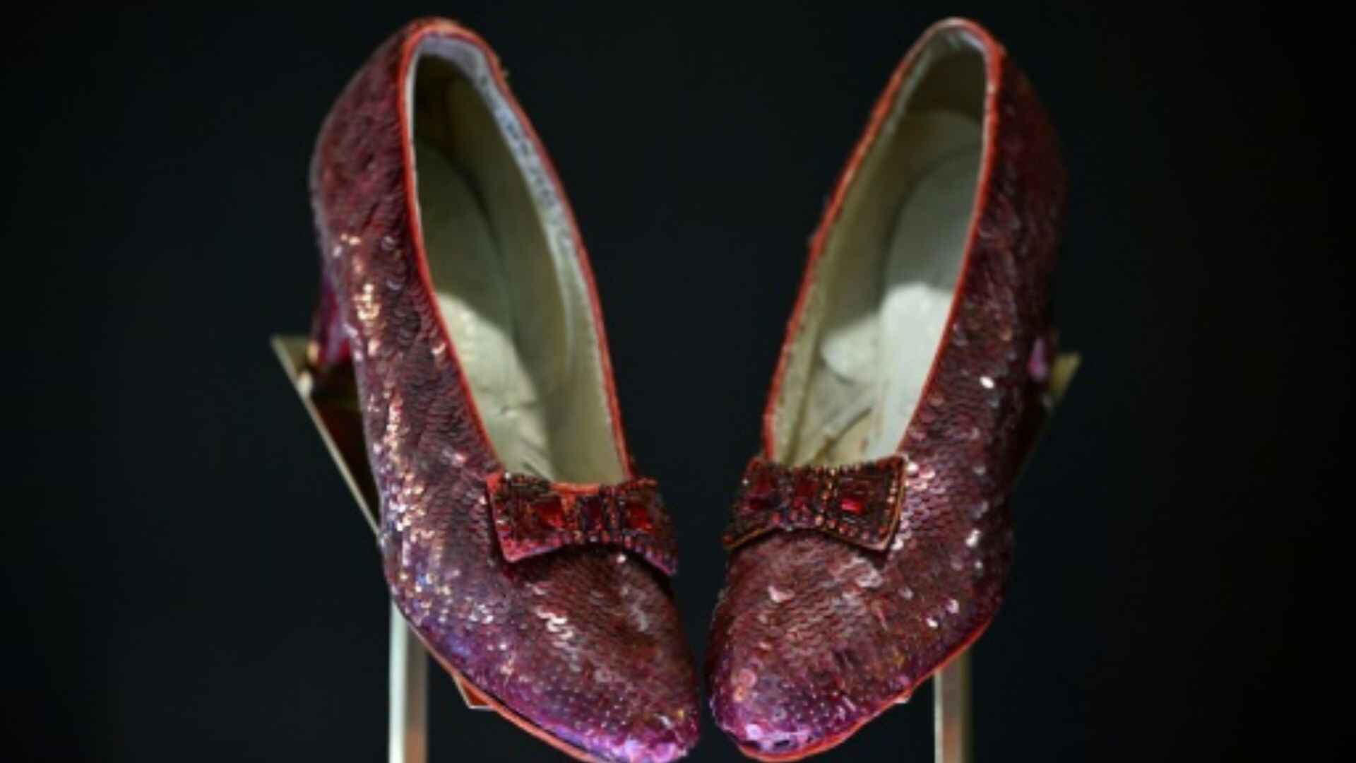 Judy Garland’s Ruby Slippers From ‘The Wizard Of Oz’ Fetch $32.5 Million At Auction